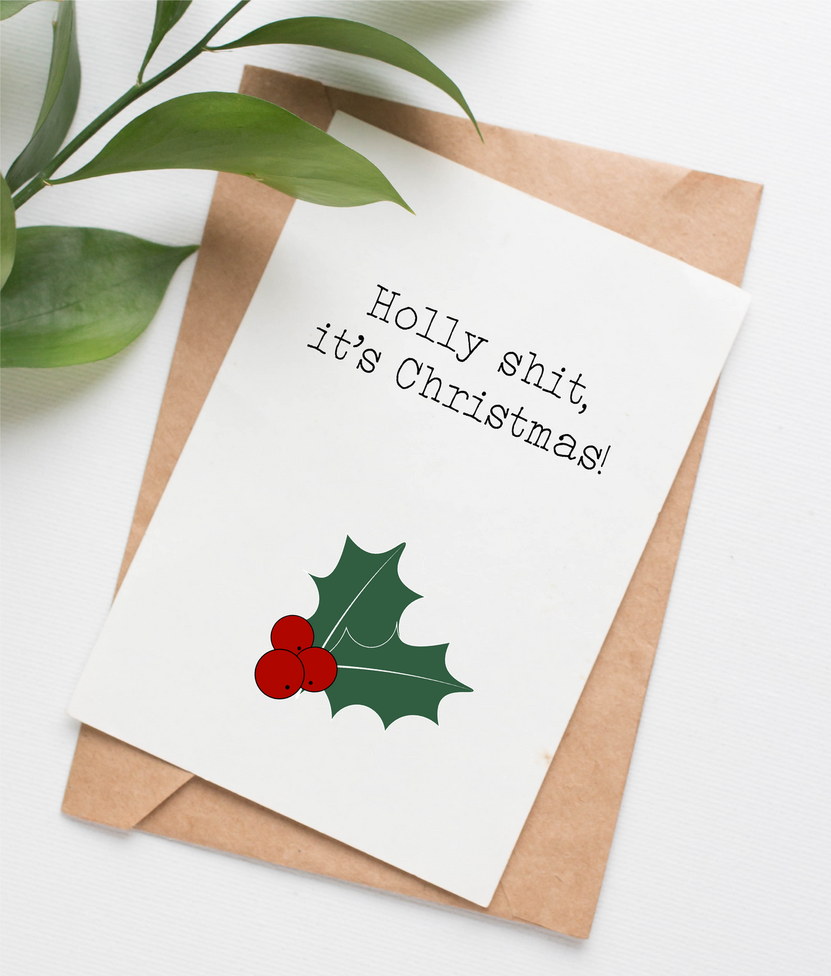 Card features a sprig of holly and the caption "Holly shit, it's Christmas!"