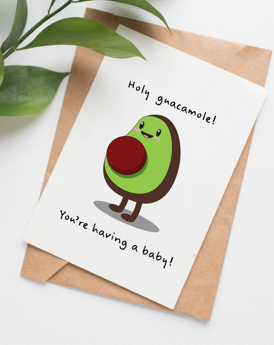 Handmade in Canada baby greeting card with cartoon avocado and text 'Holy guacamole! You're having a baby!' on a white background.