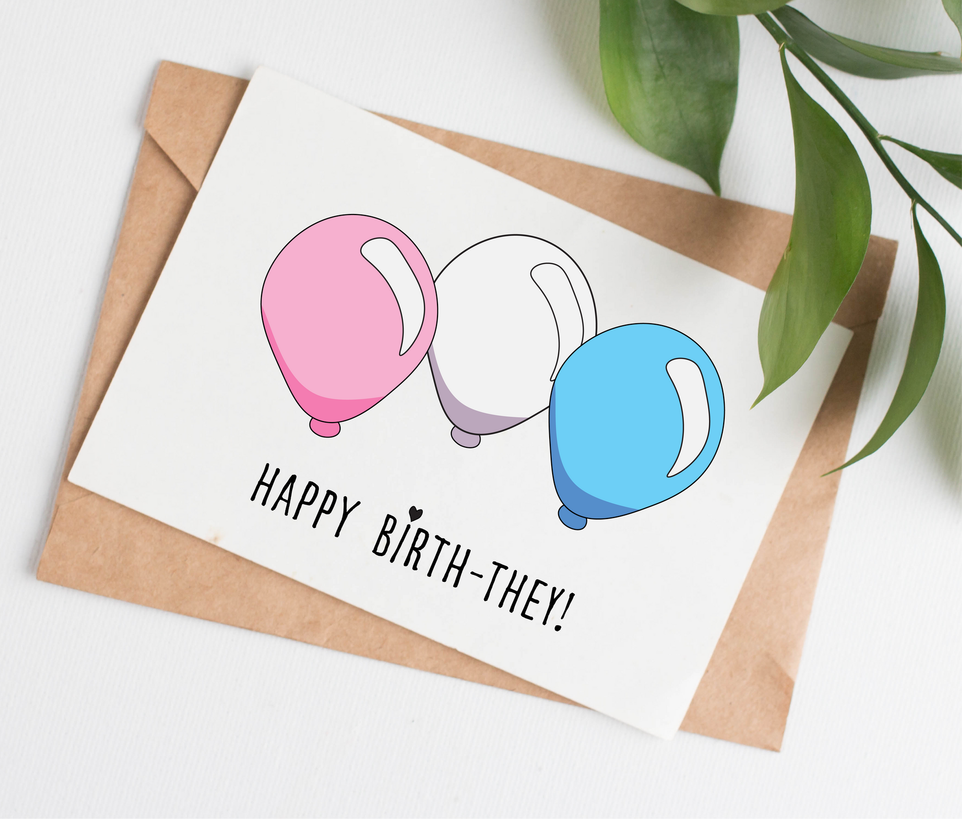 Handmade in Canada greeting card with trans pride colored balloon design and 'Happy Birth-They!' text on a white background.