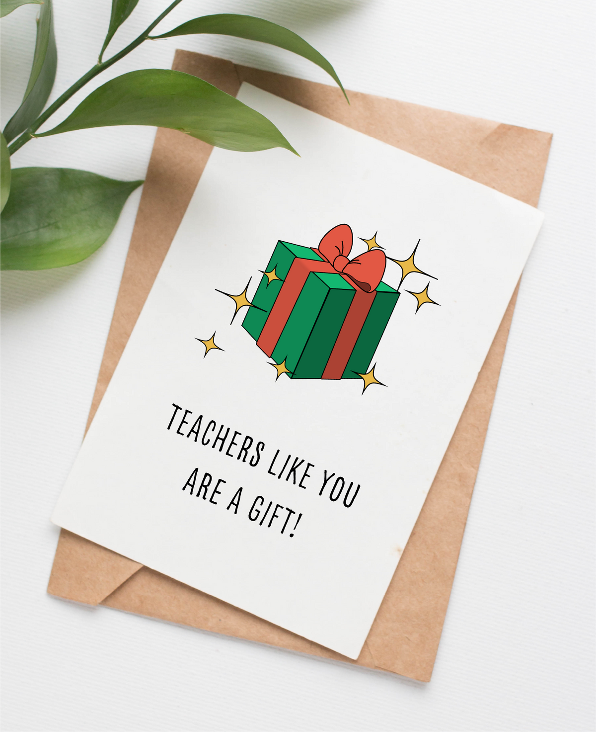 Card shows an illustration of a green and red Christmas gift with sparkles around. The caption reads "Teachers like you are a gift!"